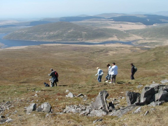 View over Plynlumon with group og walkers